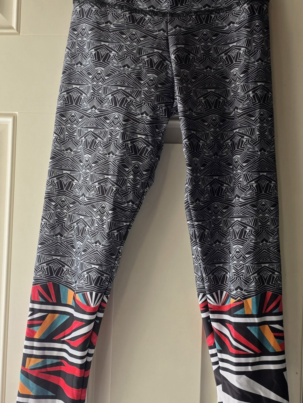 Free People Black Geometric Leggings With Red, Teal, Yellow, White Hem Panels